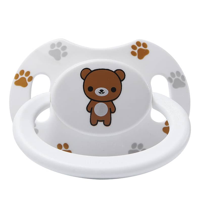 toy bear with pacifier