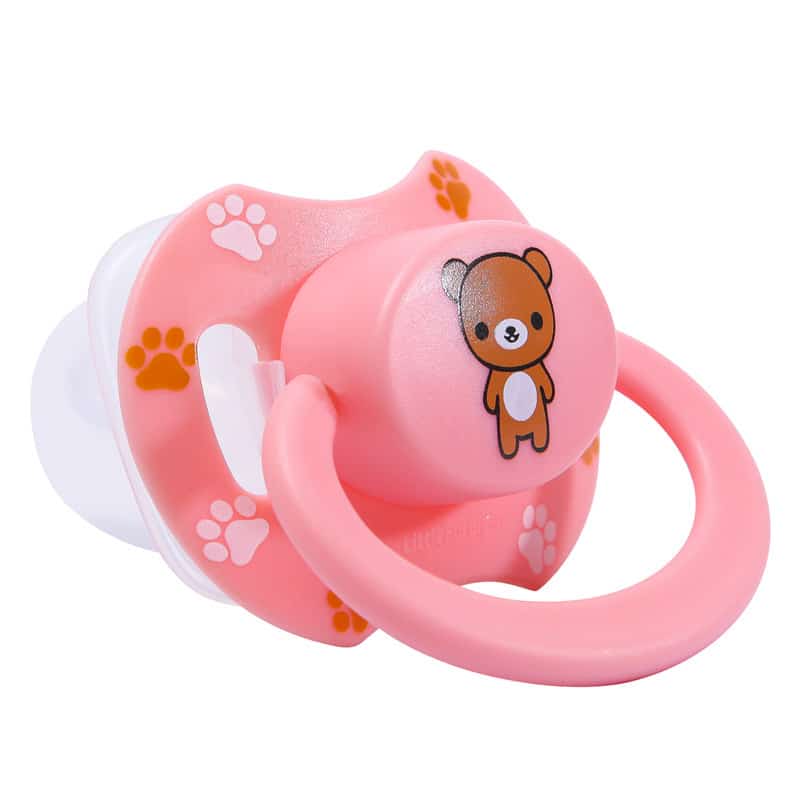 toy bear with pacifier